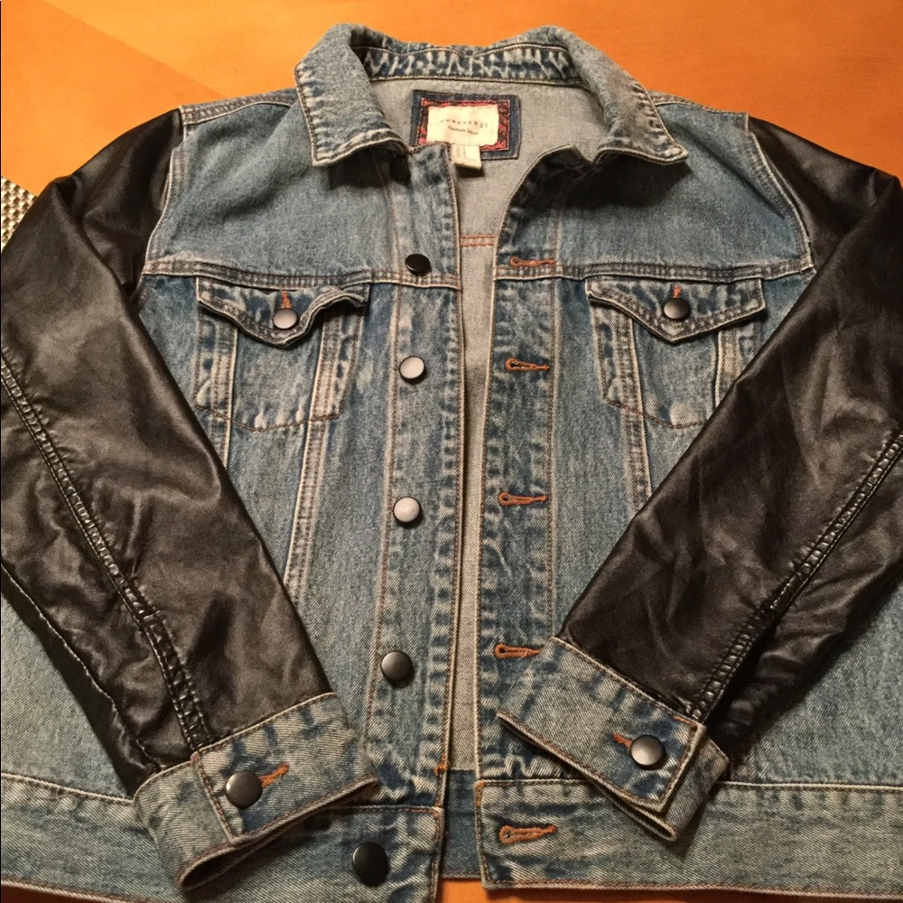 Denim jean jacket with faux leather sleeves